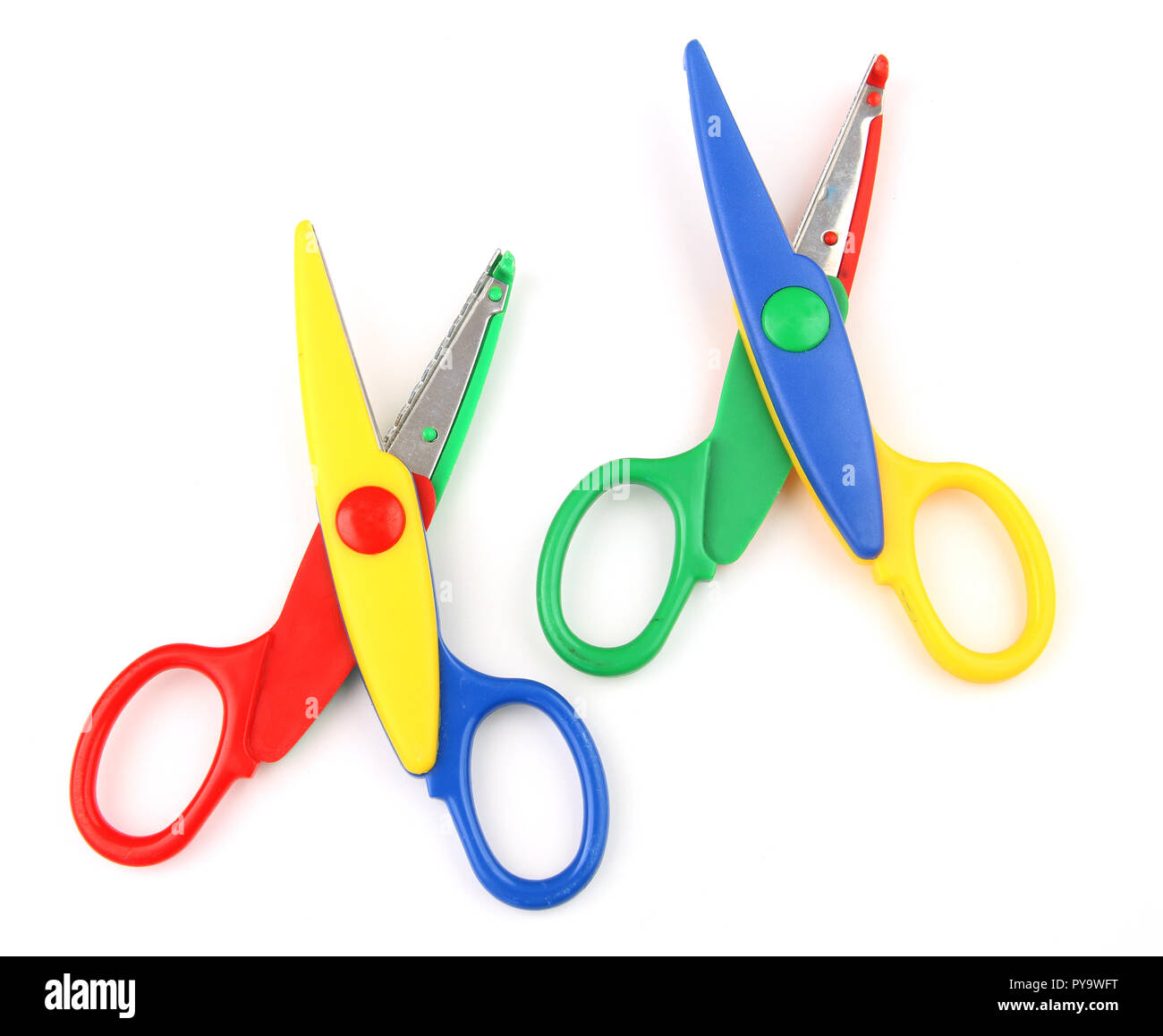 Two colorful kid's scissors isolated on white Stock Photo