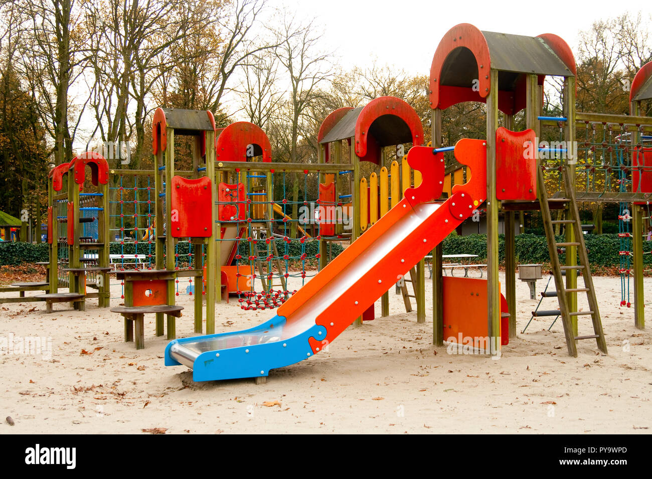 Playground with slides and ladders Stock Photo - Alamy