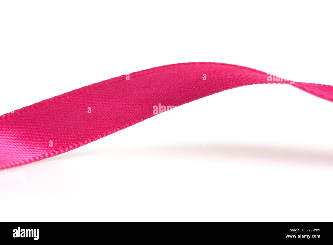 Twisted pink ribbon on white Stock Photo - Alamy