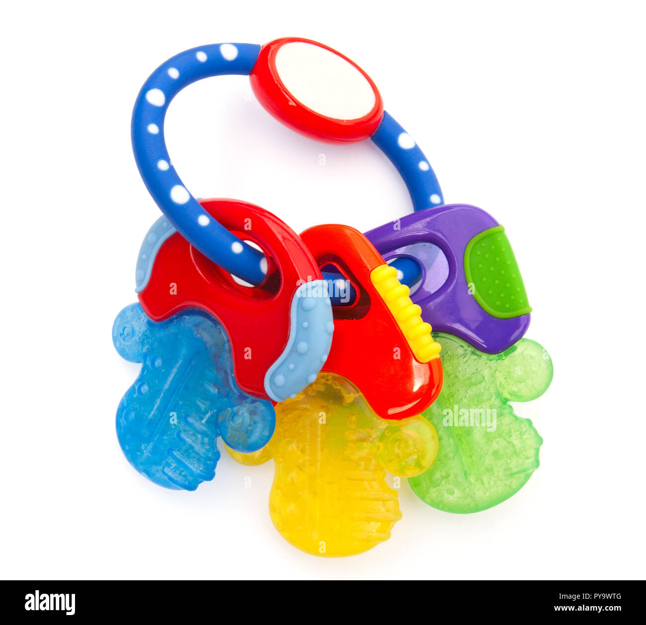 Three keys on a teething ring for babies on white Stock Photo