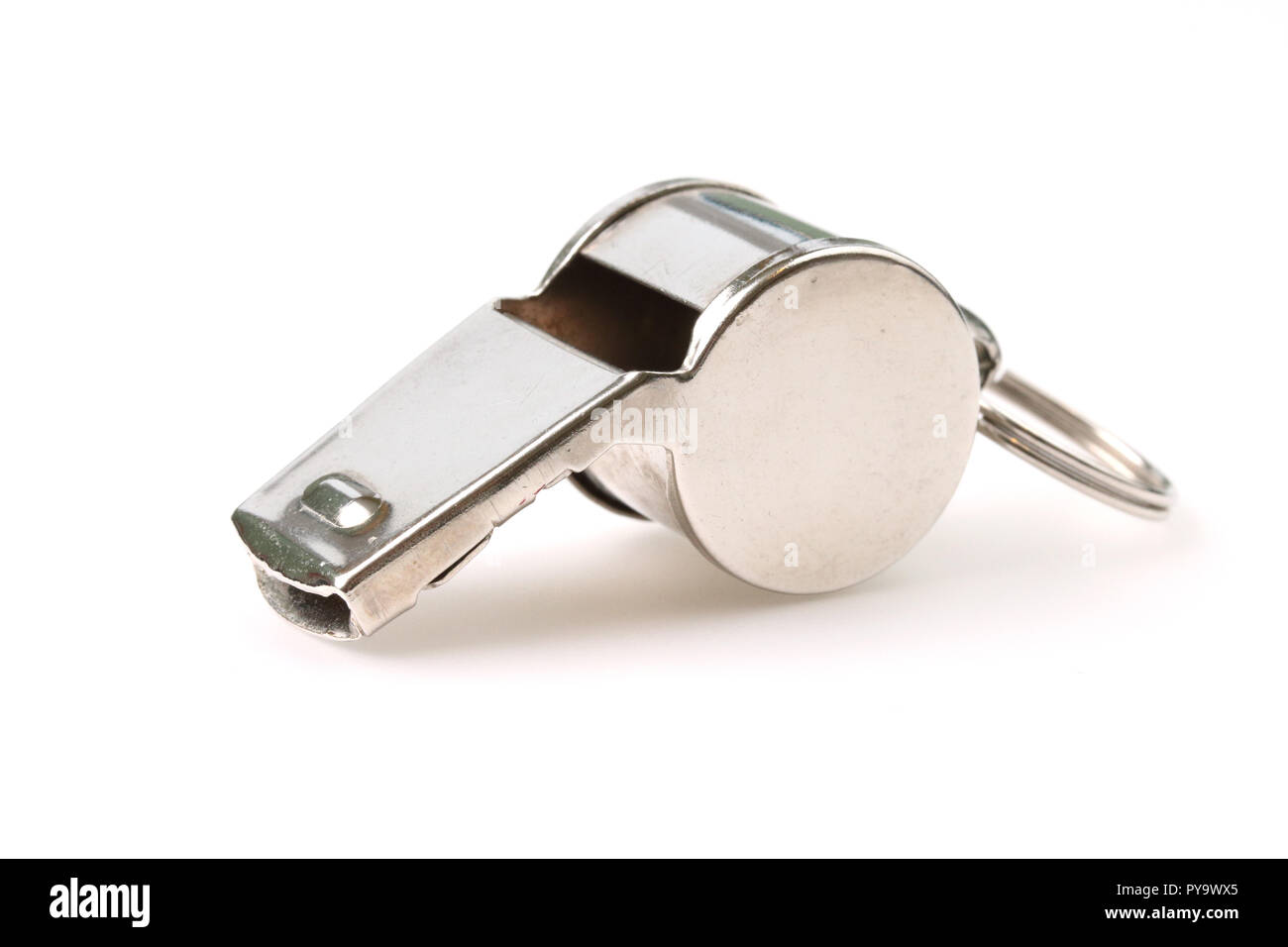 Silver referee whistle isolated on white Stock Photo