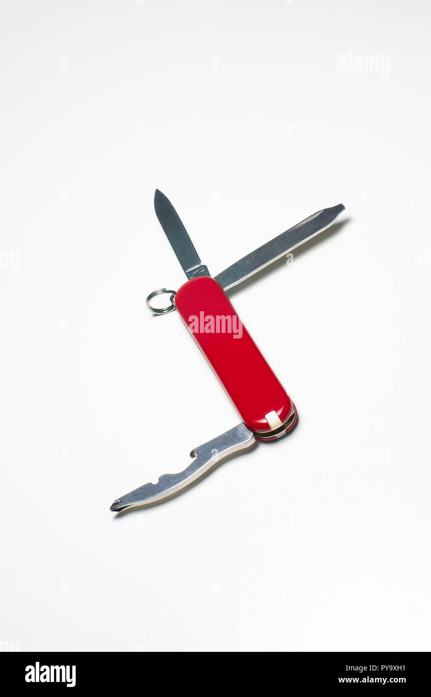 Small Swiss army knife close up isolated against white backdrop Stock Photo Alamy