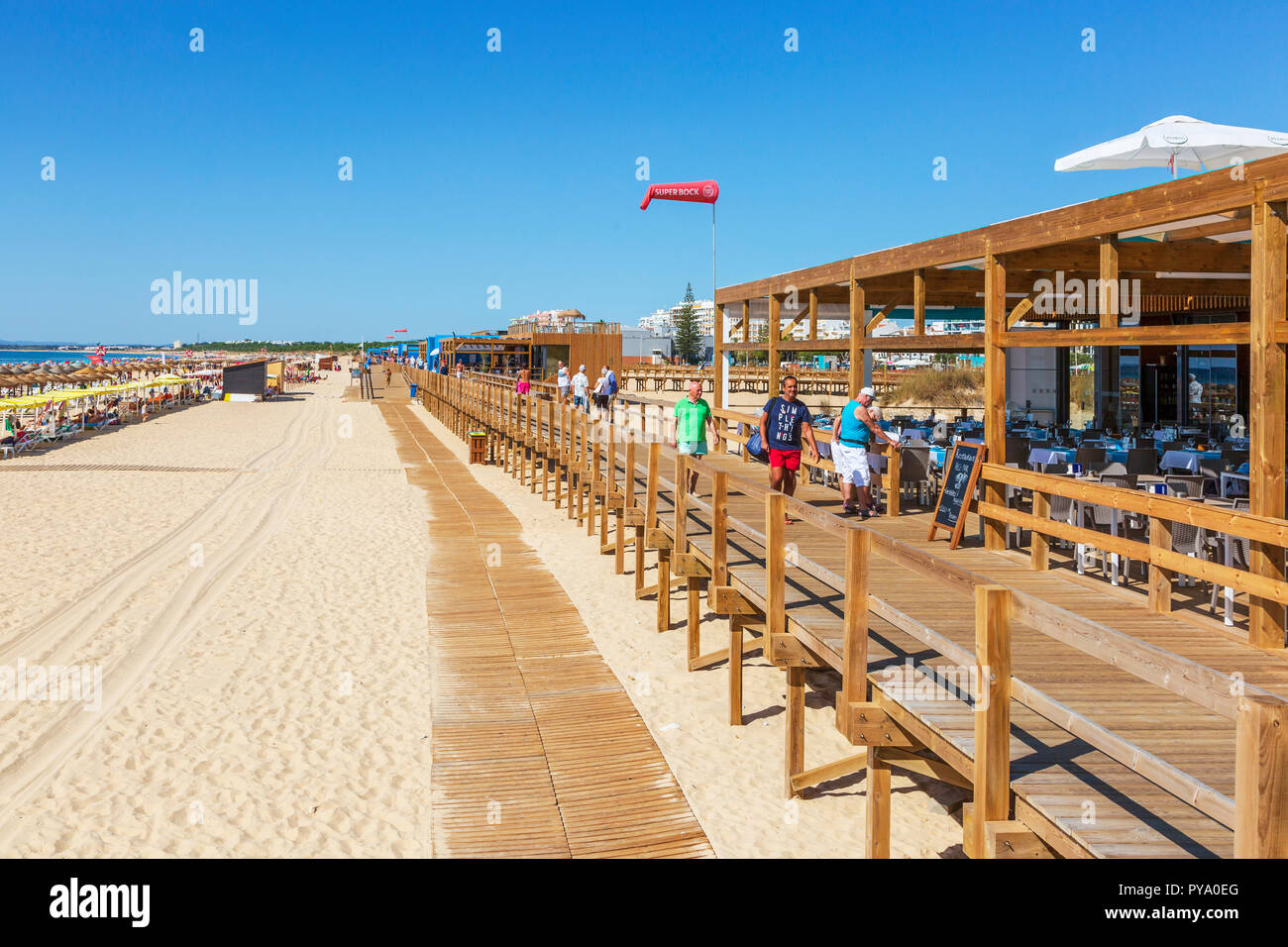 Wooden boardwalk promenade along the beach at Monte Gordo, Algarve