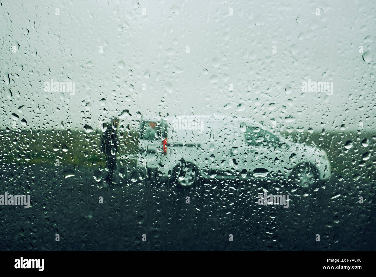 A budget rental camper van in the wet Icelandic weather Stock Photo