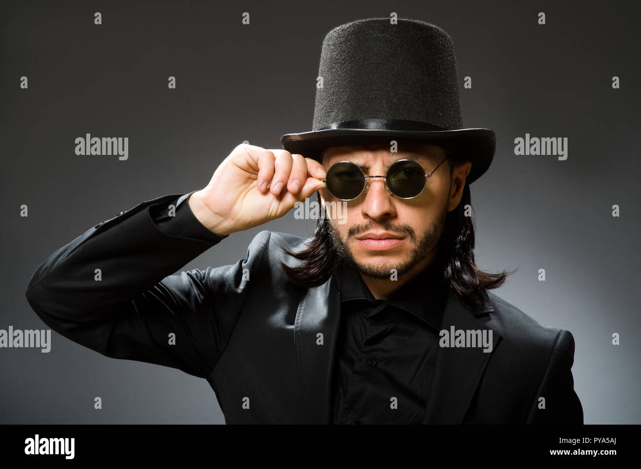 Vintage concept with man wearing black top hat Stock Photo Alamy