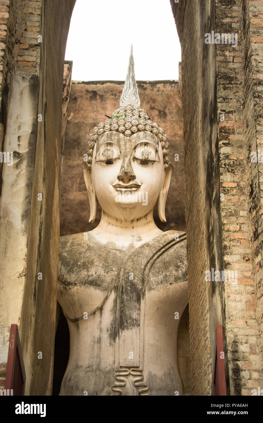 13th century temple enshrining, the largest Buddha image in Sukhothai, Thailand. Phra Achana in Wat Si Chum. Stock Photo