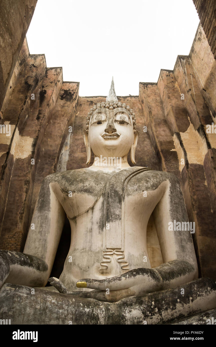 13th century temple enshrining, the largest Buddha image in Sukhothai, Thailand. Phra Achana in Wat Si Chum. Stock Photo