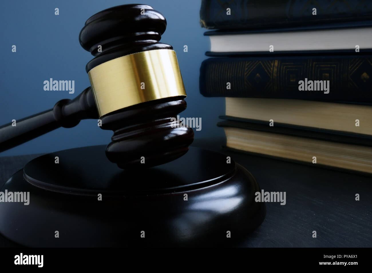 Justice concept. Gavel and law books in a court. Stock Photo