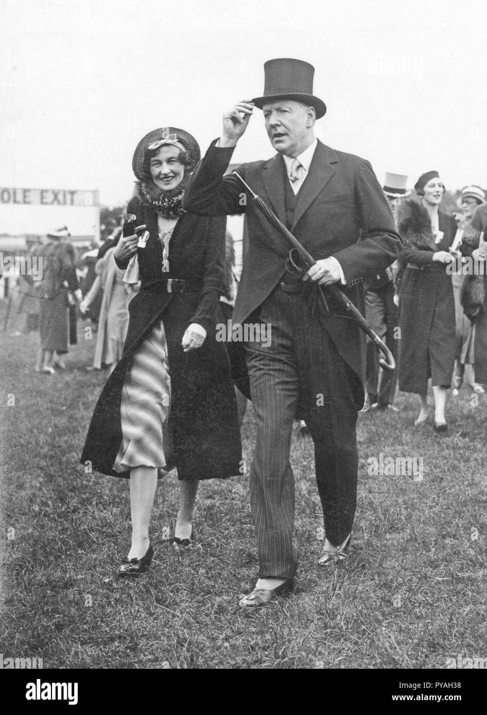 Coco Chanel , 1883-1971. French fashion designer and business woman.  Founder and namesake of the Chanel brand with it's signature scent Chanel  No. 5. Pictured here at the Epsom Derby horseracing event,