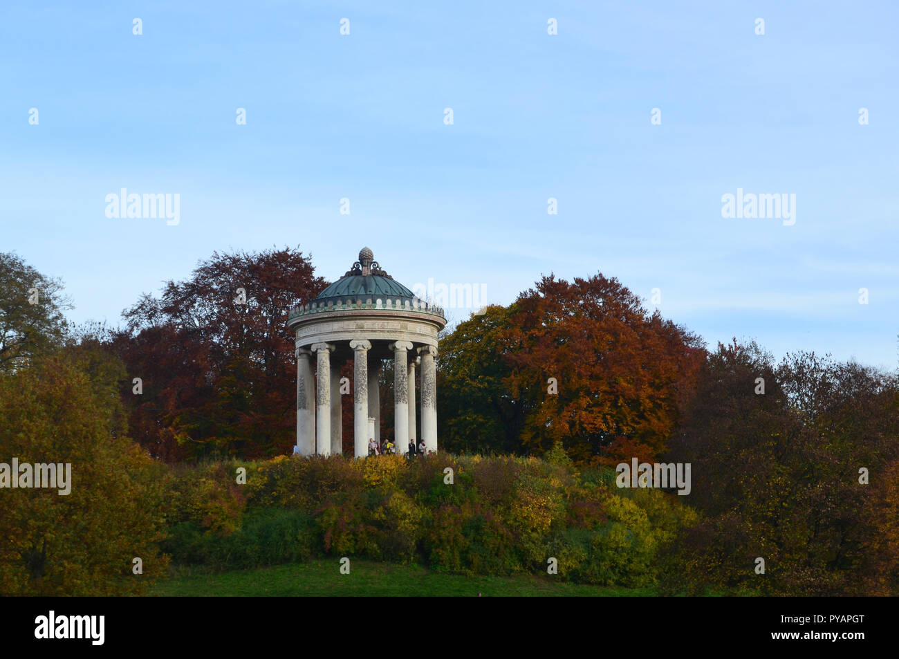 The famous Monopteros structure in English Garden in Munich, Germany during October, Autumn season ... Colored trees and fresh air. Stock Photo