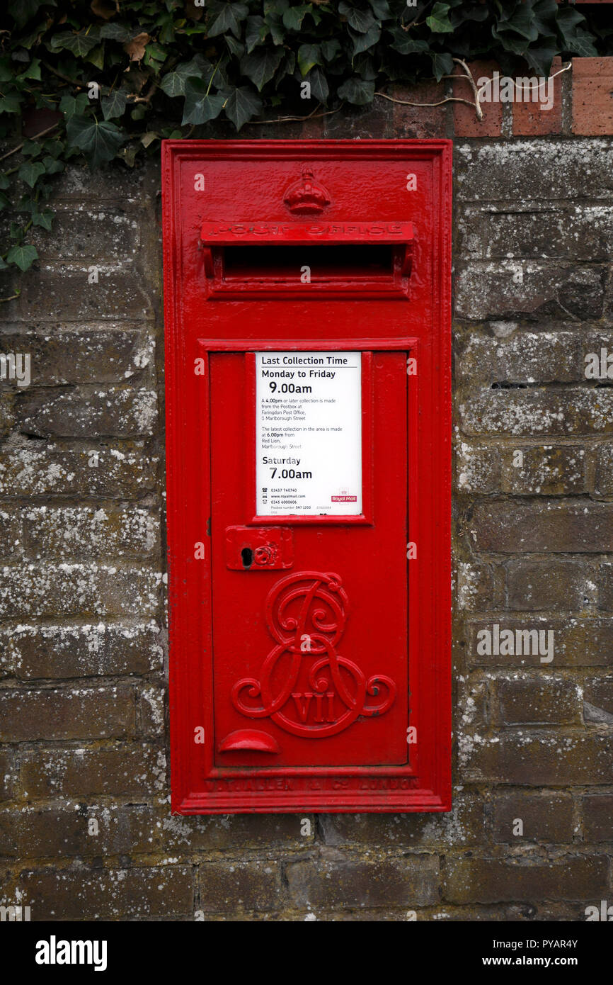 Edward VII postbox set in a wall. Made by W.T.Allen and Co, London. Stock Photo