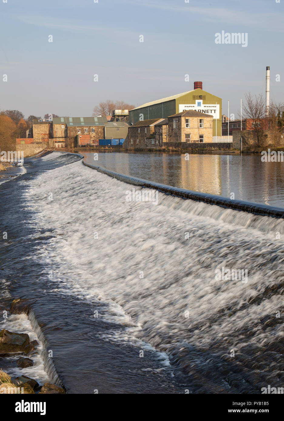 The weir and paper mill in Otley, West Yorkshire Stock Photo