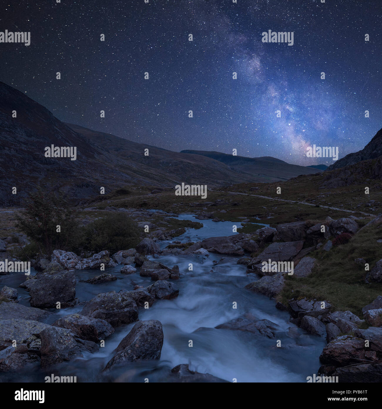 Stunning vibrant Milky Way composite image over Landscape image of ...