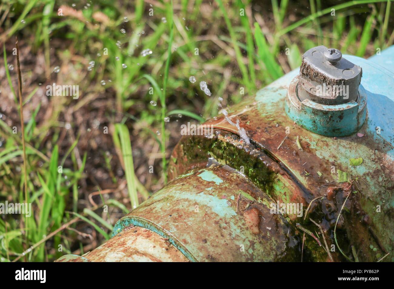 water valve broken plumbing tube and leak at wait repair plumber Stock