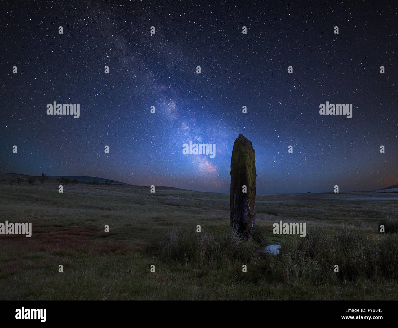 Stunning vibrant Milky Way composite image over landscape of Ancient ...