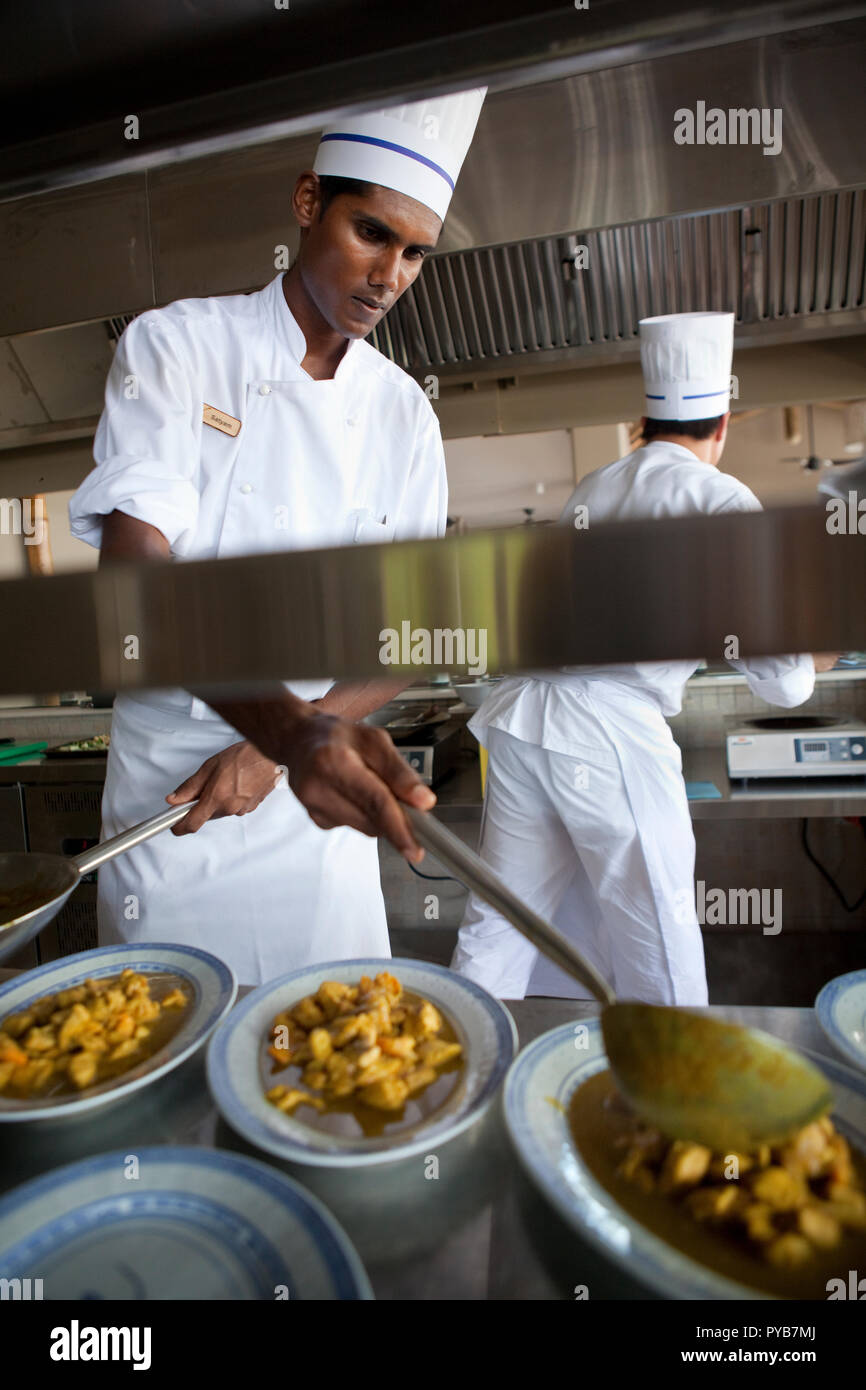 Hotel chefs serving up curry in Mauritius. Stock Photo