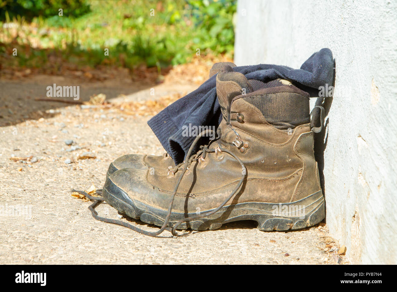 Hiking boots with socks Stock Photo