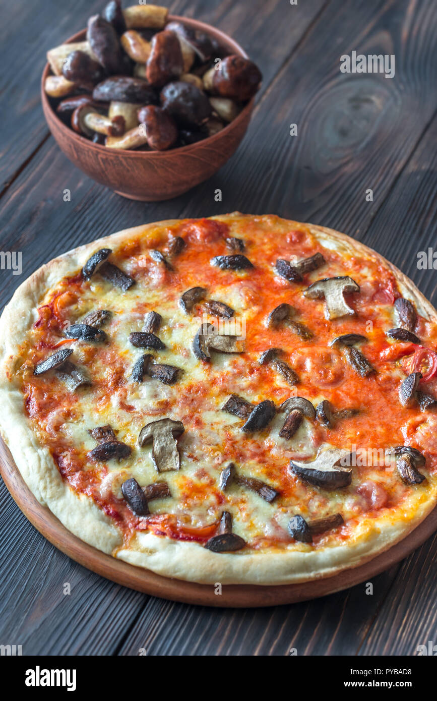 Pizza with porcini mushrooms Stock Photo Alamy