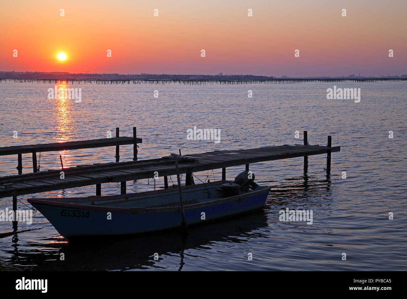 Sunrise on the pond of Thau in Bouzigues, Occitanie, France Stock Photo