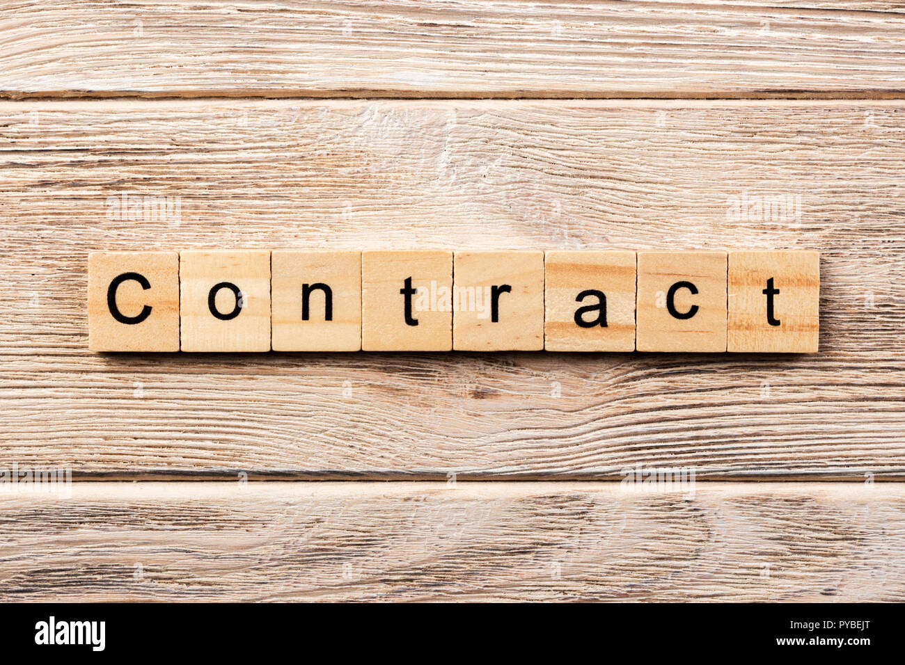 contract word written on wood block. contract text on table, concept Stock Photo Alamy