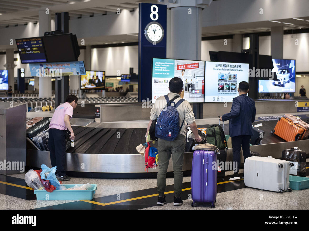 Hong Kong. 14th Oct, 2018. Travellers are seen waiting for their