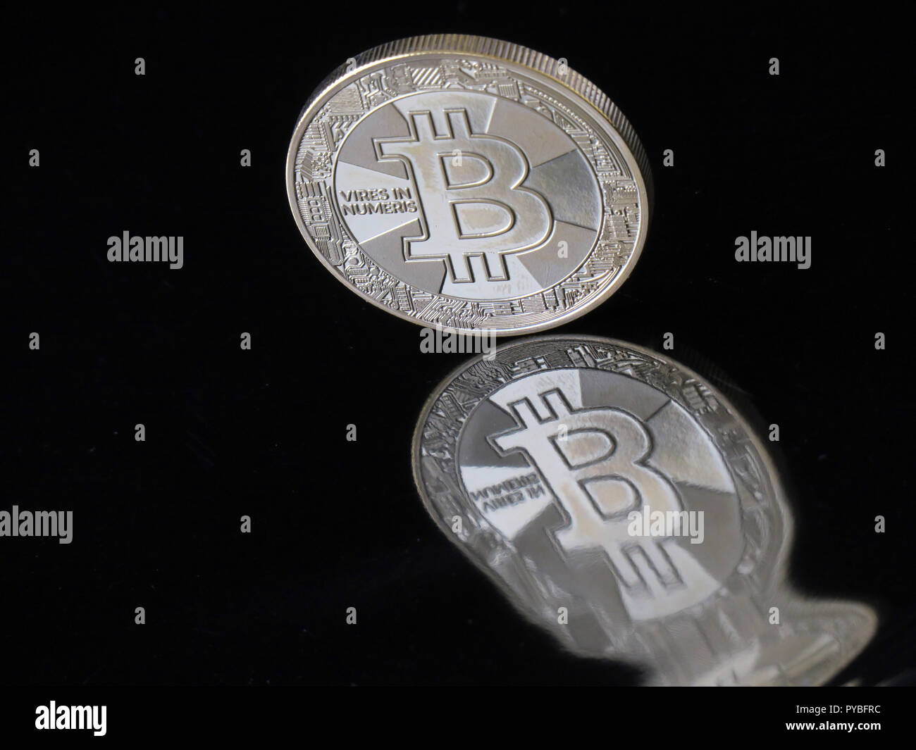 Berlin, Germany. 30th Aug, 2018. 30 August 2018, Germany, Berlin: A Bitcoin  coin with the imprint 