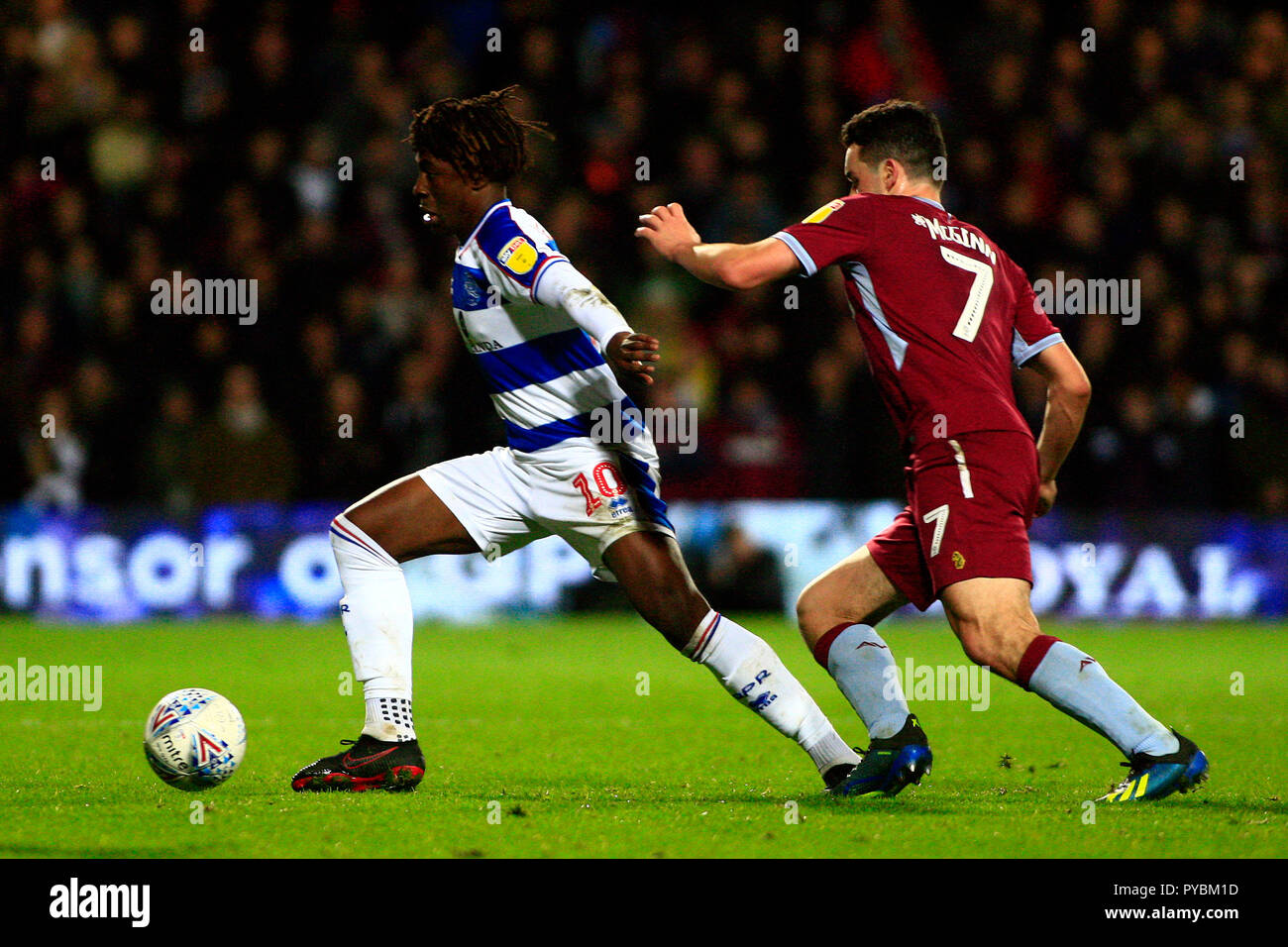 Eberechi Eze of Queens Park Rangers (L) in action with John McGinn of Aston Villa (R). EFL Skybet championship match, Queens Park Rangers v Aston Villa at Loftus Road stadium in London on Friday 26th October 2018.  this image may only be used for Editorial purposes. Editorial use only, license required for commercial use. No use in betting, games or a single club/league/player publications. pic by Steffan Bowen/Andrew Orchard sports photography/Alamy Live news Stock Photo