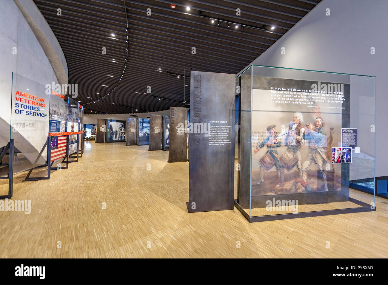 Columbus, Ohio, USA. 25th Oct, 2018. One wing of the displays at the National Veterans Memorial and Museum photographed Thursday, October 25, 2018 in Columbus, Ohio. The NVMM will open officially to the public on Saturday October 26, 2018. Retired Army Gen. Colin L. Powell will deliver a keynote address about the role of veterans in our country and the innovation, courage and strength they provide communities. The new building, designed by U.S.-based Allied Works Architecture, is a sort of concrete cake. Or as the firm describes it, "Intersecting bands of concrete, arranged in concentric Stock Photo