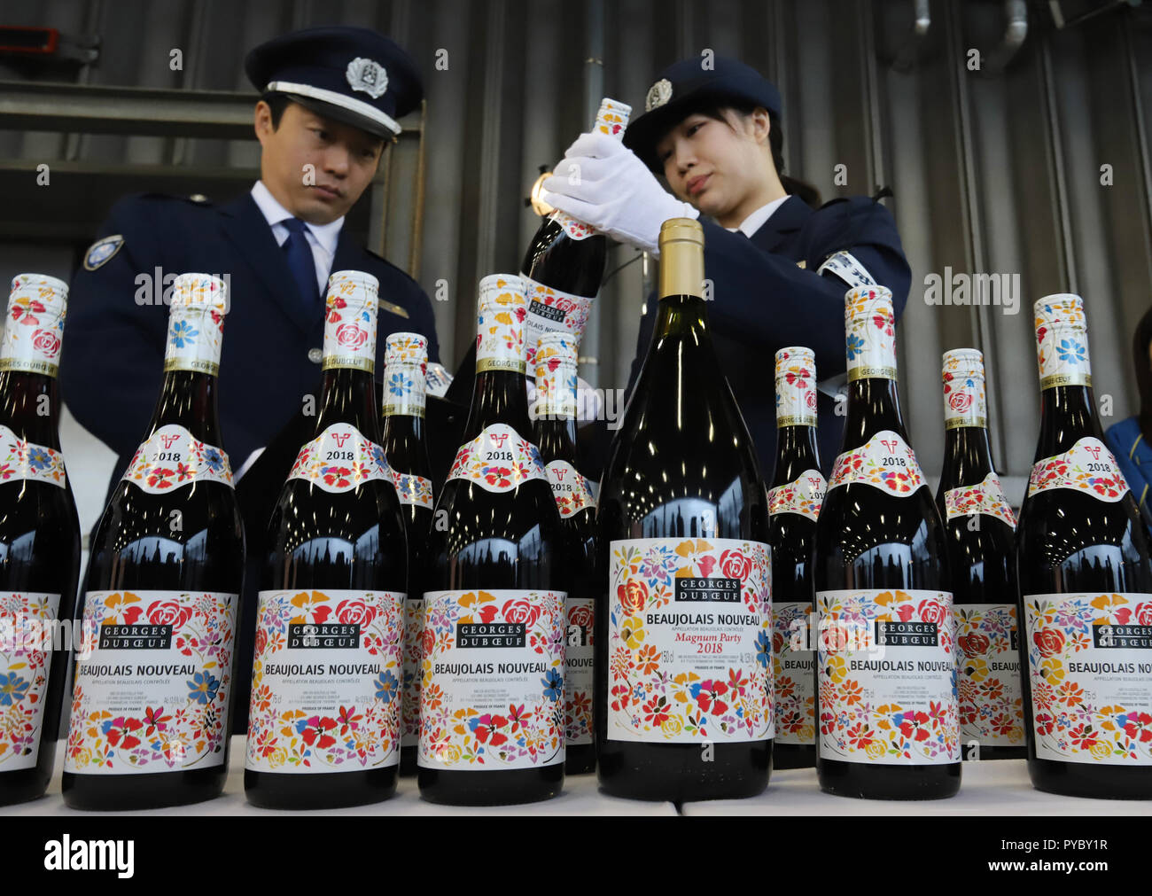 Tokyo Japan 27th Oct 18 Japanese Customs Officers Check A Bottle Of 18 Vintage Beaujolais Nouveau Wine Shortly After Its Arrival At Tokyo S Haneda Airport On Saturday October 27 18 The First