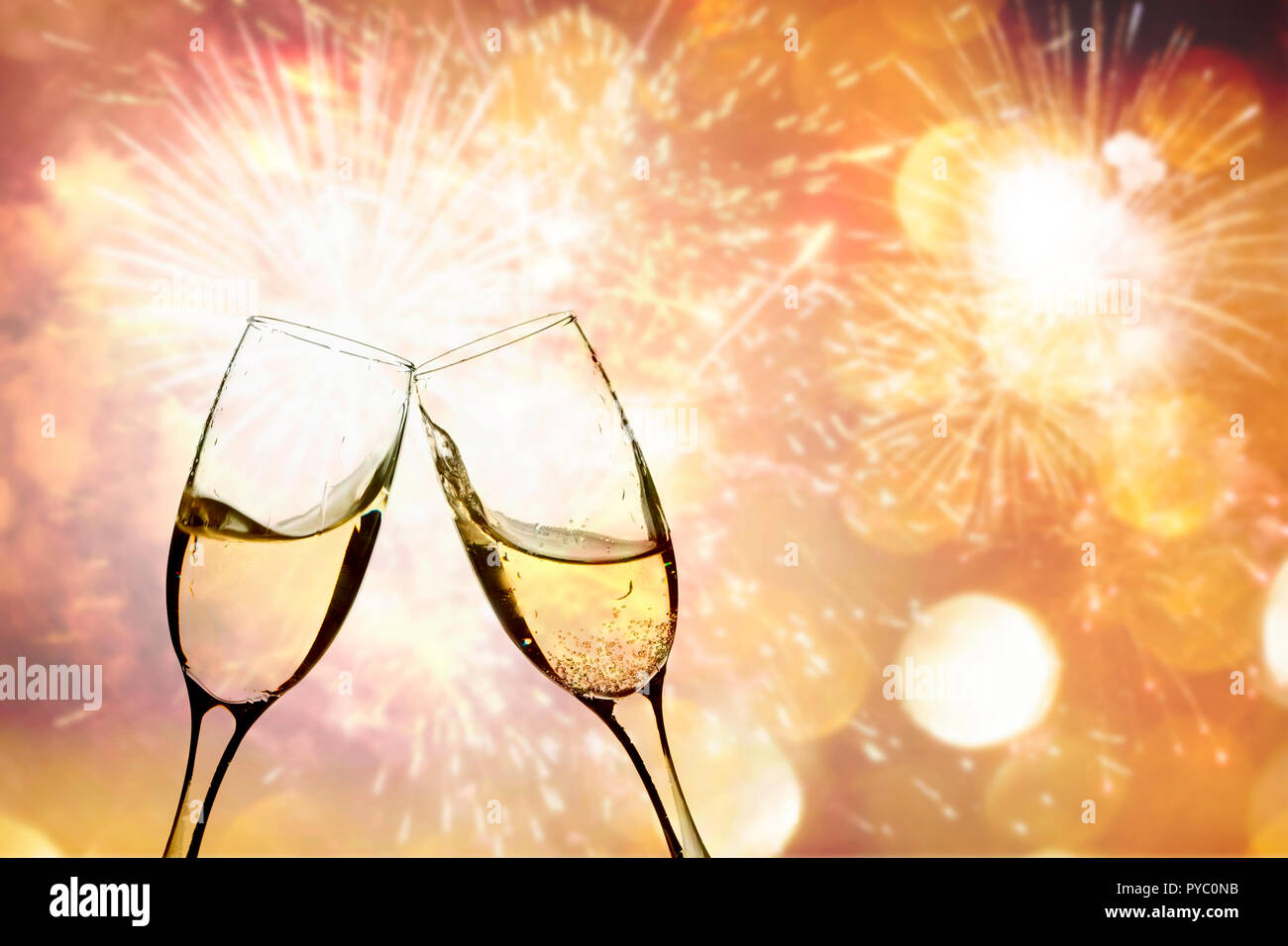 Champagne glasses on holidaybackground Stock Photo - Alamy