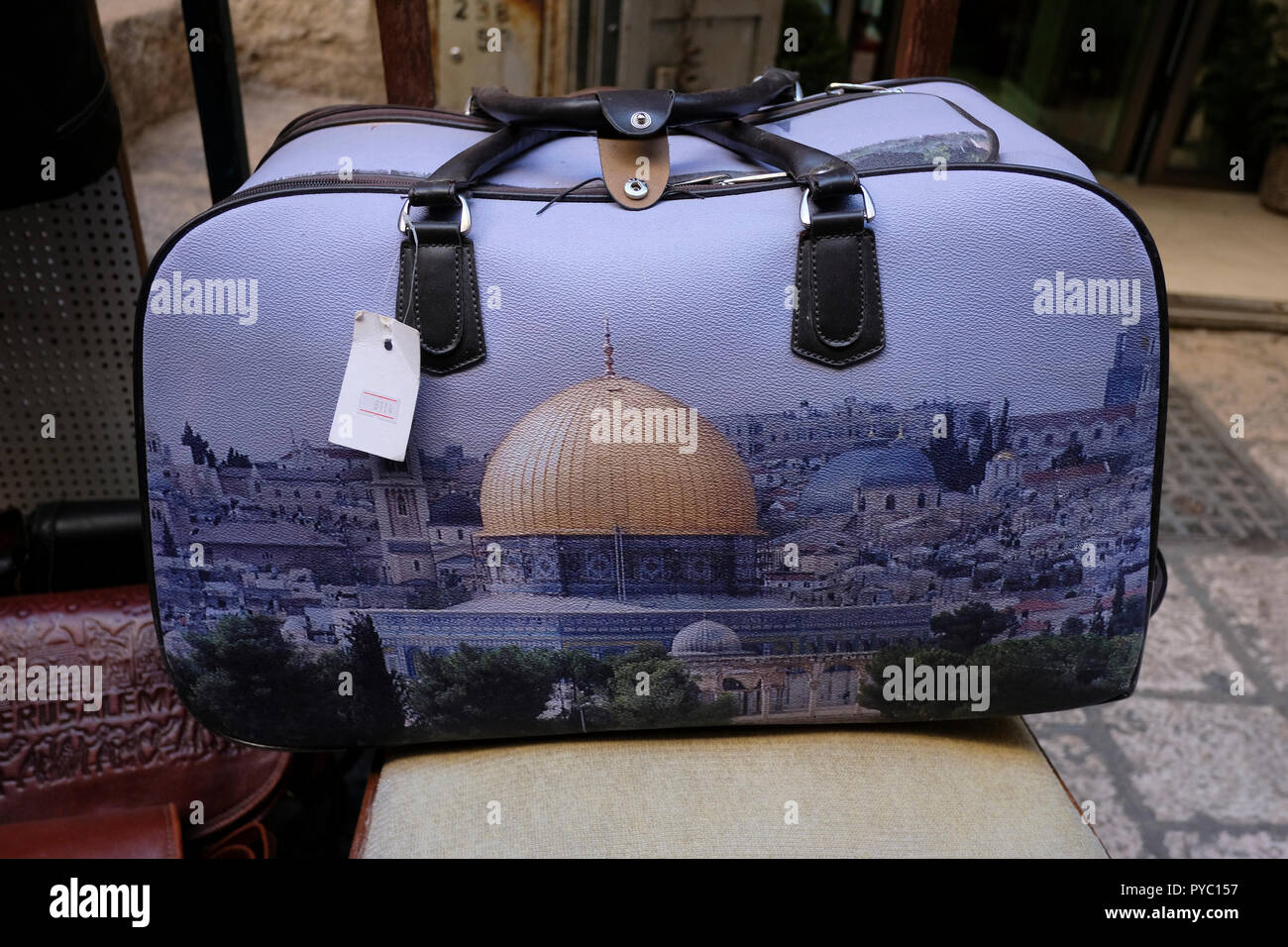 A bag features the Islamic shrine Dome of the Rock Jerusalem's iconic landmark  for sale in a souvenir shop in the Muslim Quarter in the old city East Jerusalem Israel Stock Photo