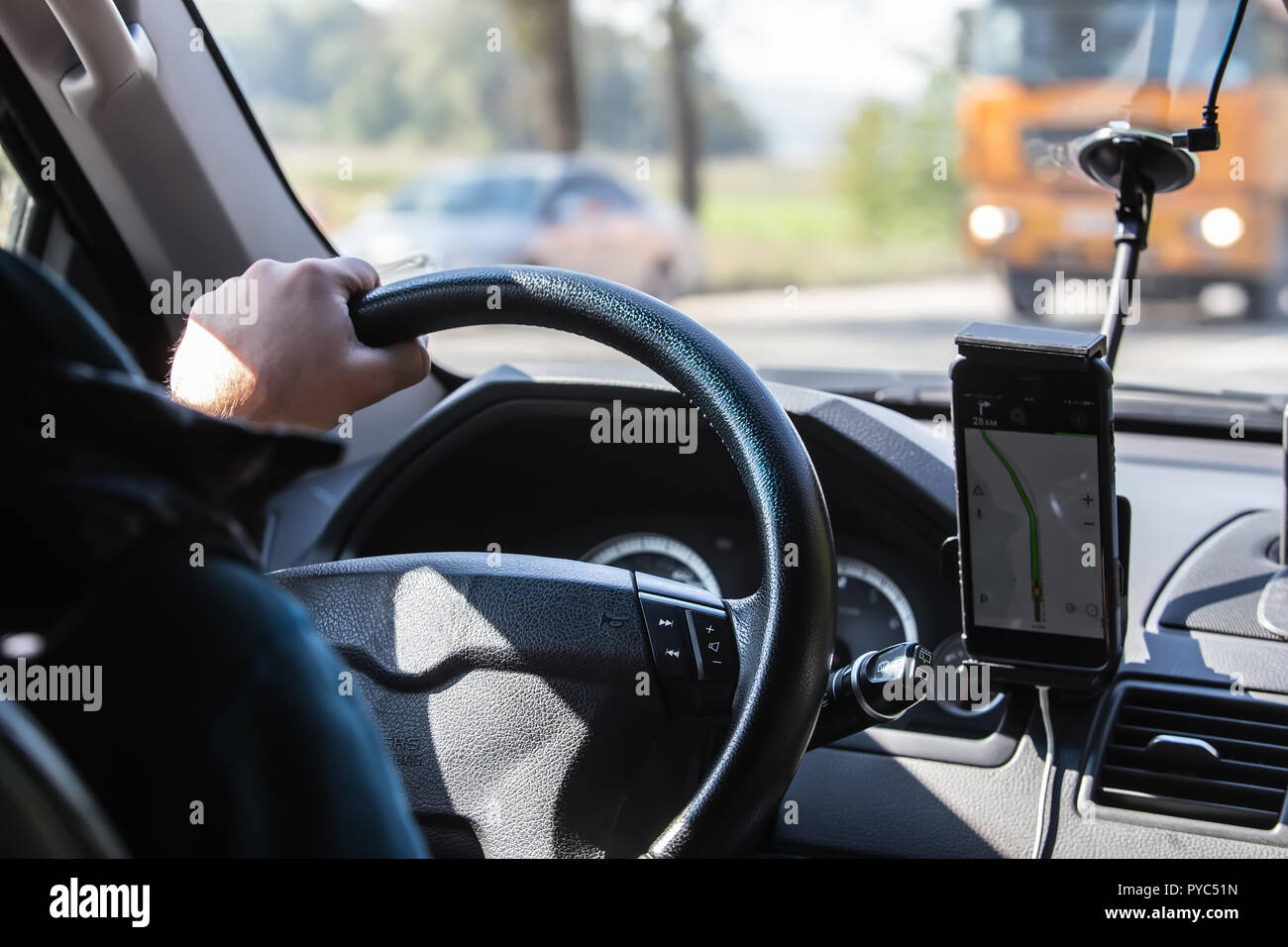 Drivers hand holding steering wheel hi-res stock photography and images ...