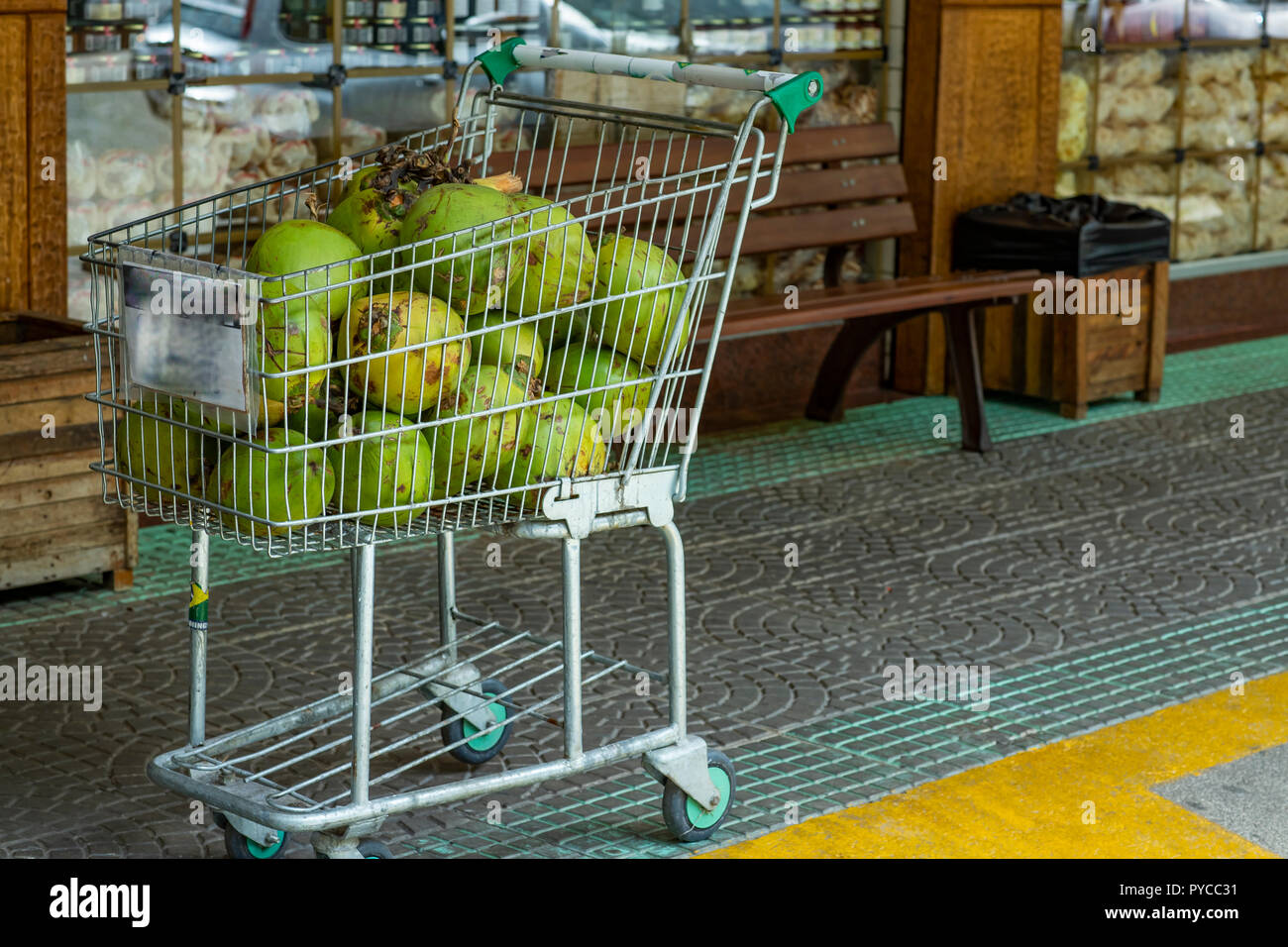 Green coconut. Pile of Green coconuts water for sale in the Market