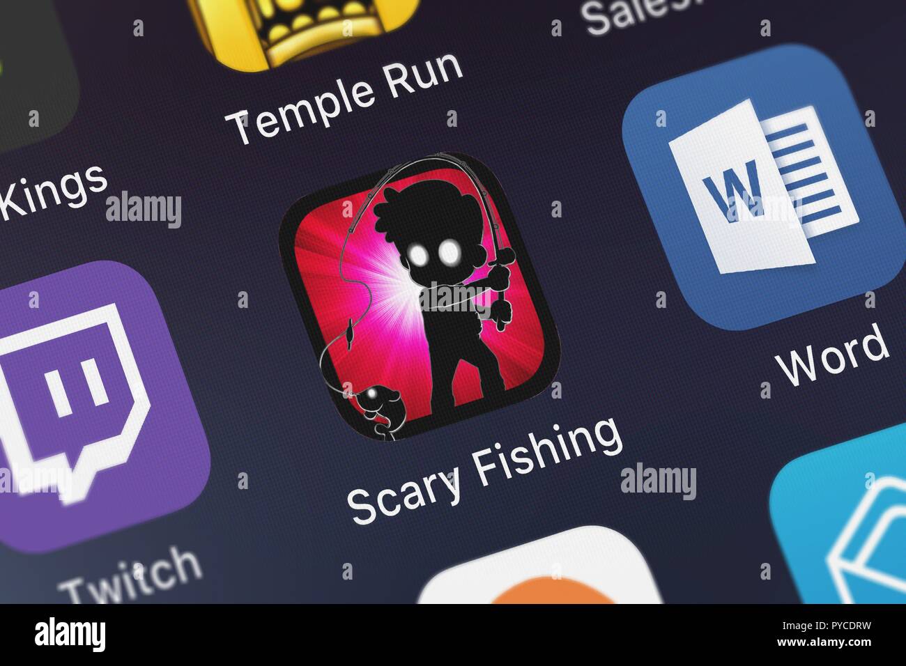 London, United Kingdom - October 26, 2018: Screenshot of the Scary Fishing : Fun Games About Fish mobile app from Psycho Bear Studios icon on an iPhon Stock Photo