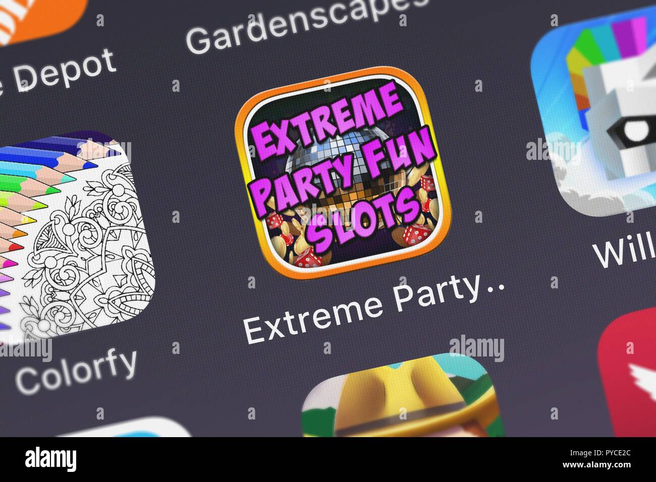 London, United Kingdom - October 26, 2018: Close-up shot of Psycho Bear Studios's popular app Extreme Party Fun Slots - Best Casino Games. Stock Photo