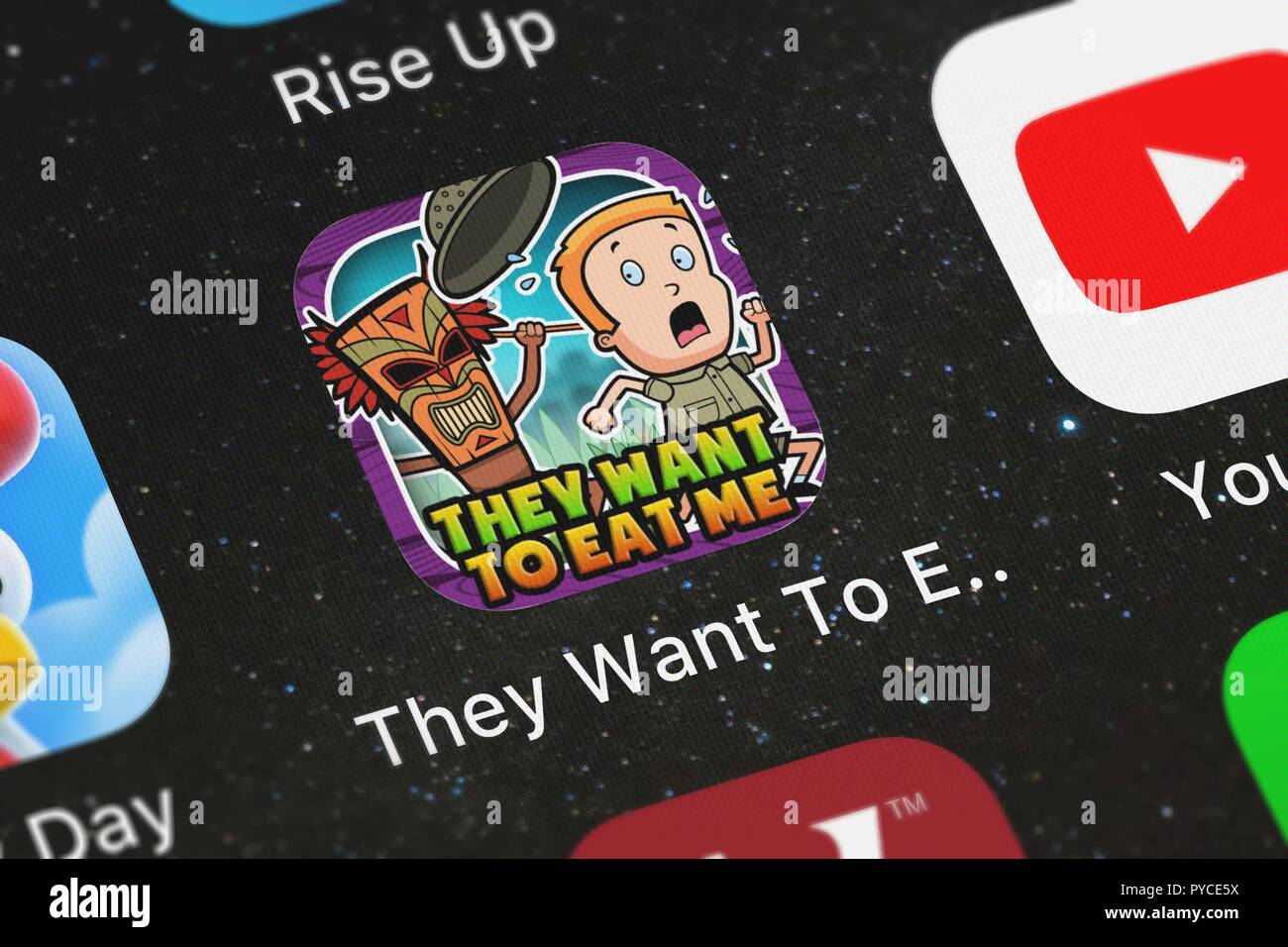 London, United Kingdom - October 26, 2018: Close-up of the They Want To Eat Me icon from Psycho Bear Studios on an iPhone. Stock Photo