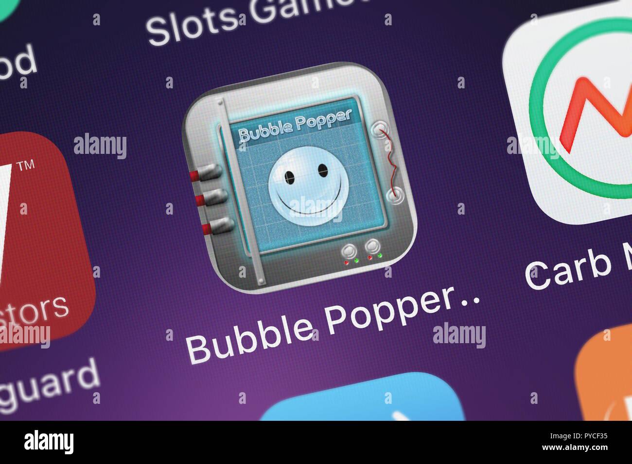London, United Kingdom - October 26, 2018: Screenshot of the Bubble Popper Game HD Lite mobile app from Pop-ok.com icon on an iPhone. Stock Photo