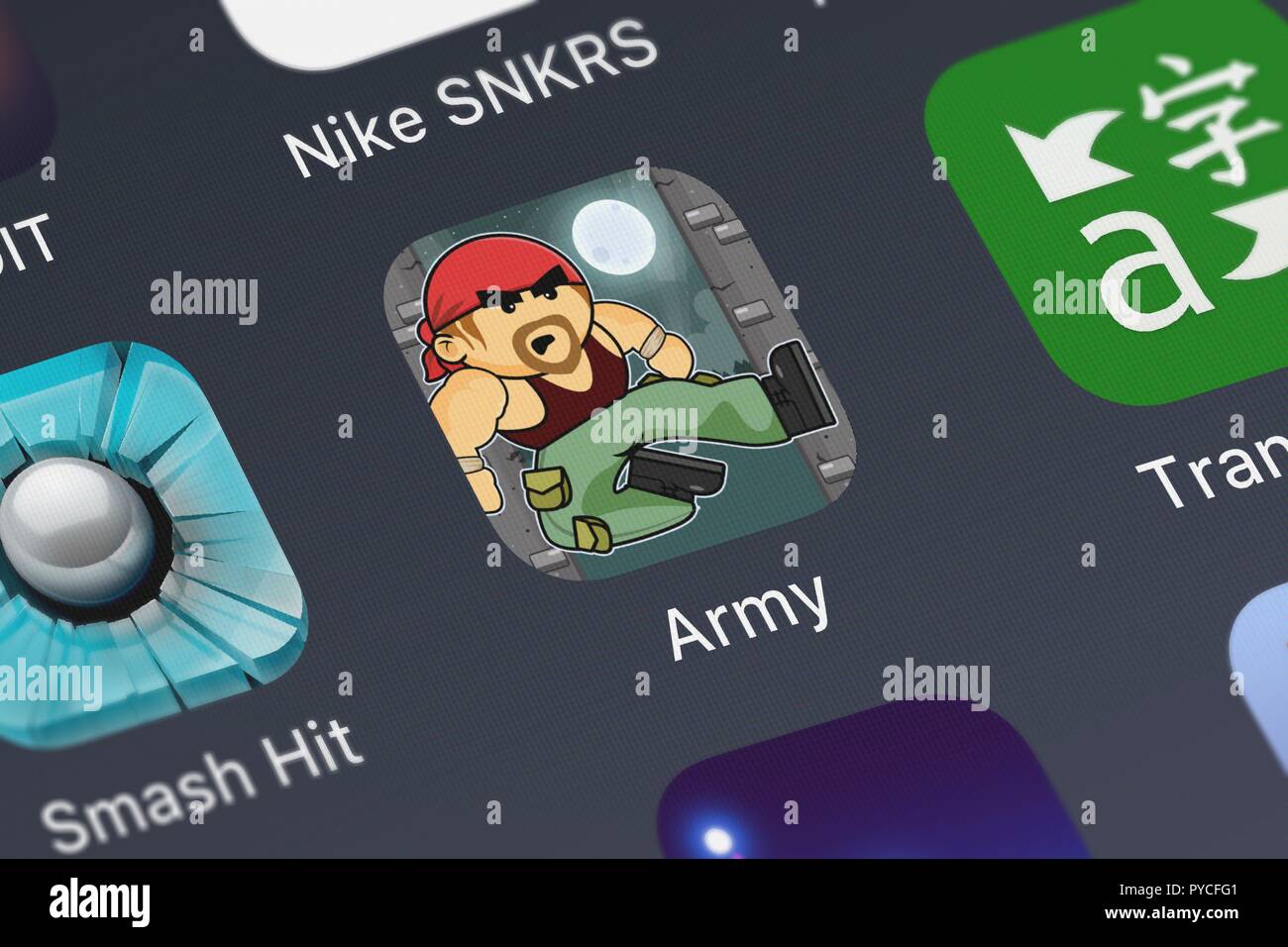 London, United Kingdom - October 26, 2018: Screenshot of the Army Hit, Kick and Punch Like Crazy mobile app from Pop-ok.com icon on an iPhone. Stock Photo