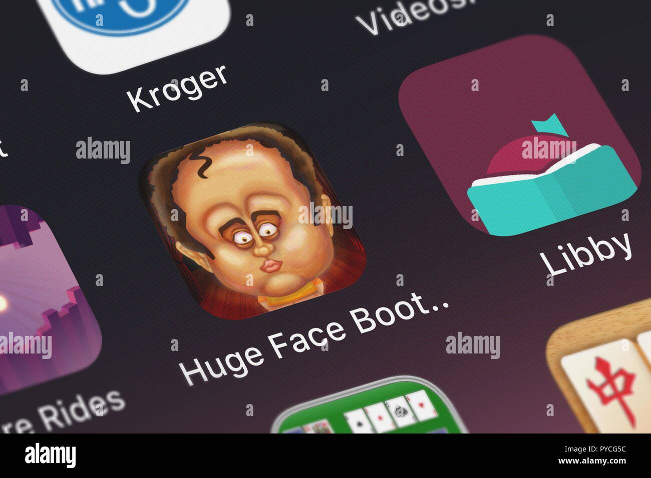 London, United Kingdom - October 26, 2018: Close-up of the Huge Face Booth Lite icon from Pop-ok.com on an iPhone. Stock Photo