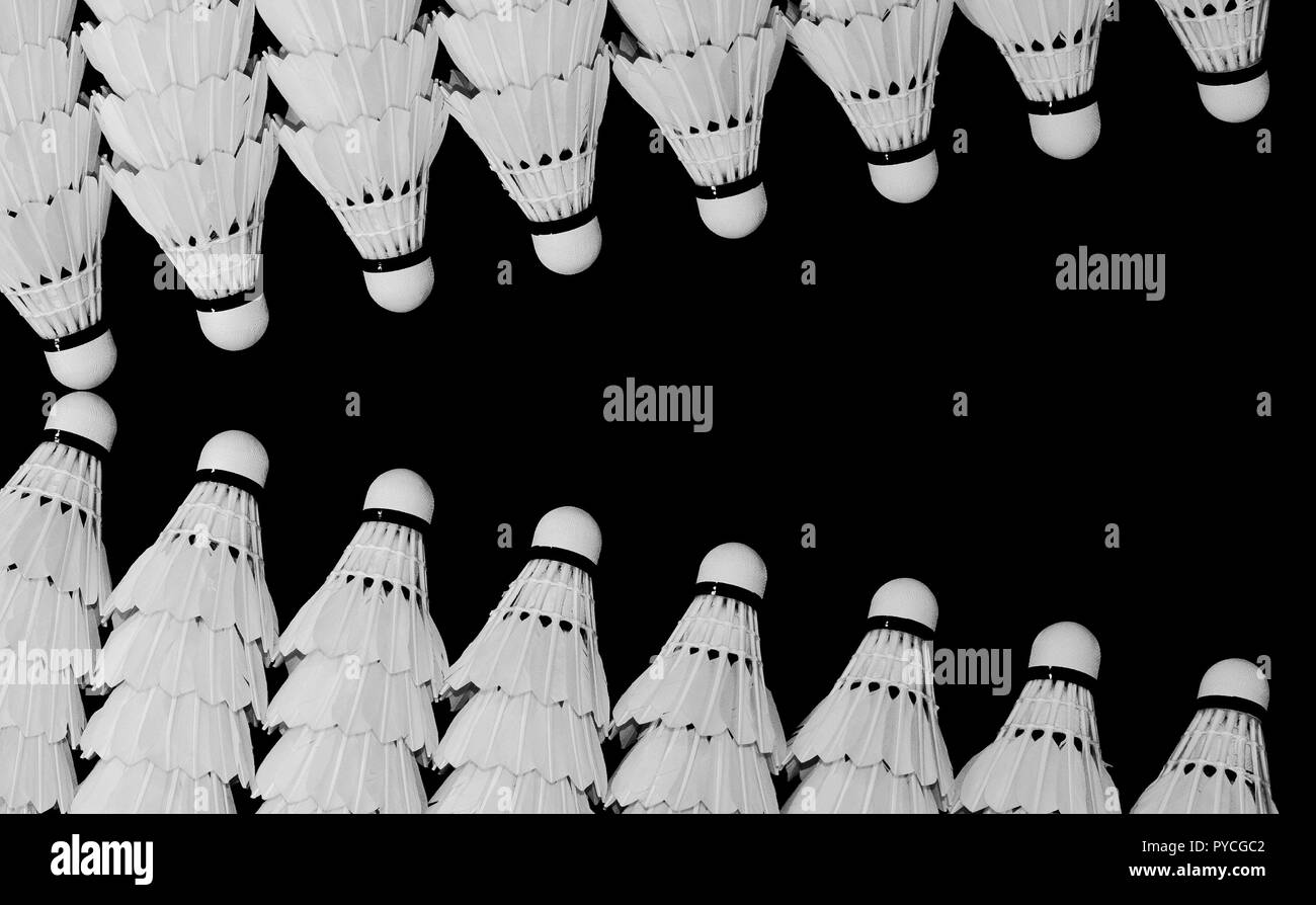 White shuttlecock isolated on black background. Image can be used as ...