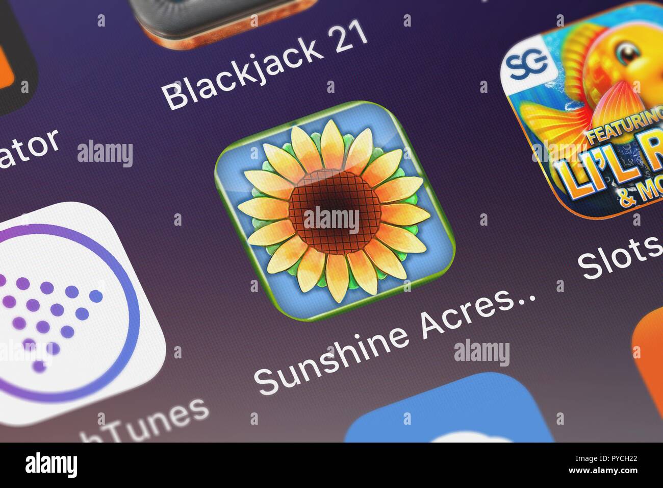 London, United Kingdom - October 26, 2018: Screenshot of the Sunshine Acres HD mobile app from Alawar Entertainment, Inc icon on an iPhone. Stock Photo