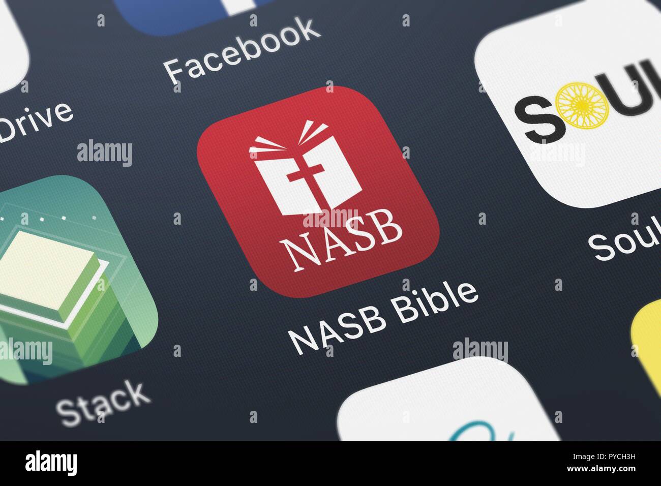 London, United Kingdom - October 26, 2018: Icon of the mobile app NASB Bible from Tecarta, Inc. on an iPhone. Stock Photo
