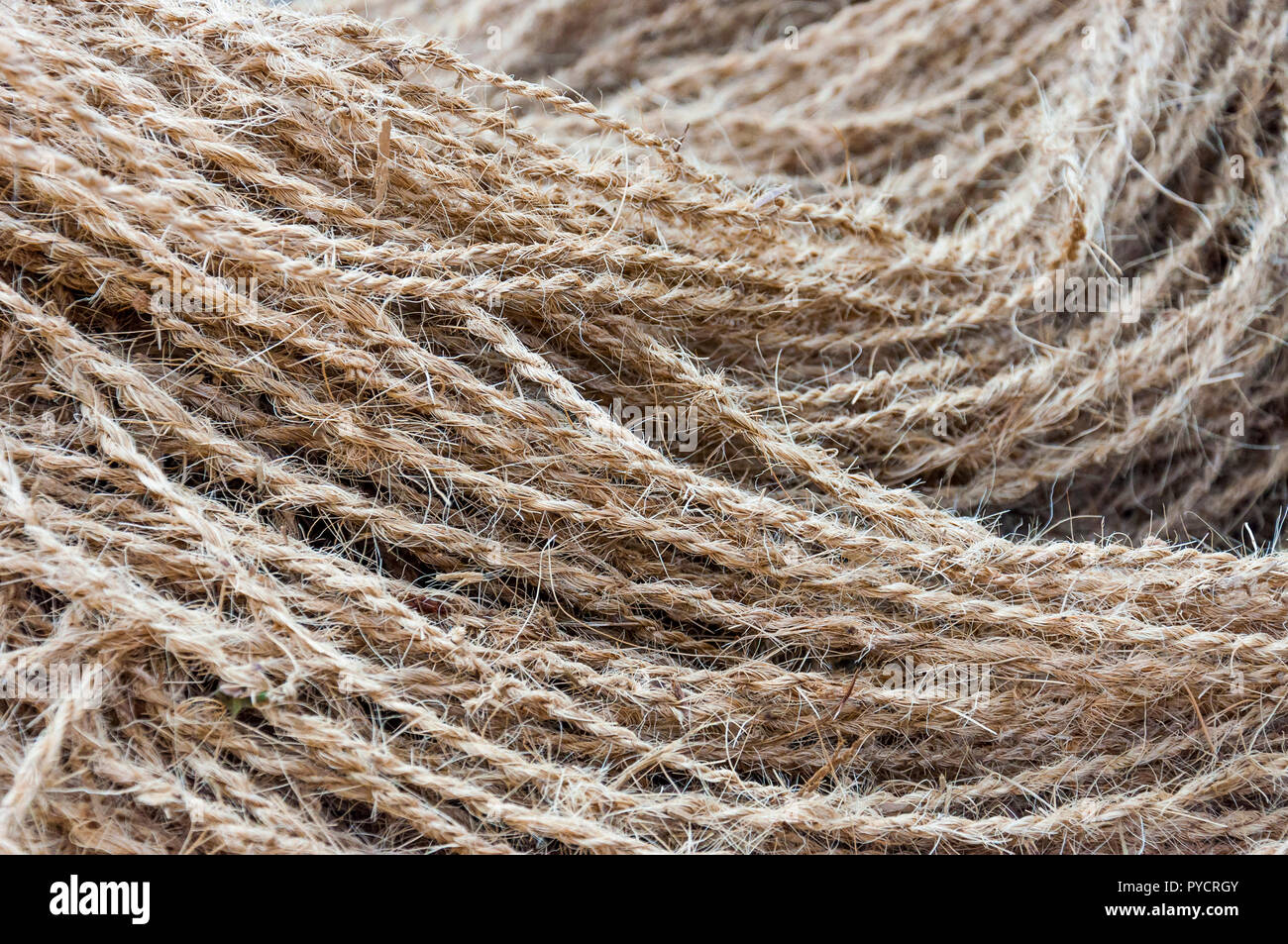 Here you can see the Indian handmade braided coconut rope that women in Kerala Backwaters made every day for many hundreds years. Stock Photo