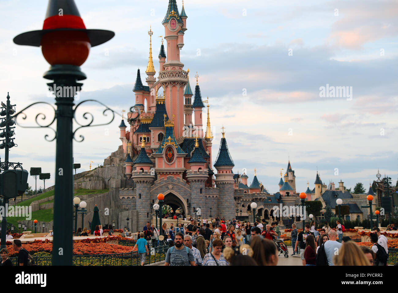 Marne-la-VallÃ©e, France - October 14, 2018: Sunset At  Sleeping Beauty Castle In Disneyland Paris (Euro Disney), Crowd Of People, Marne-la-VallÃ©e, Ã Stock Photo
