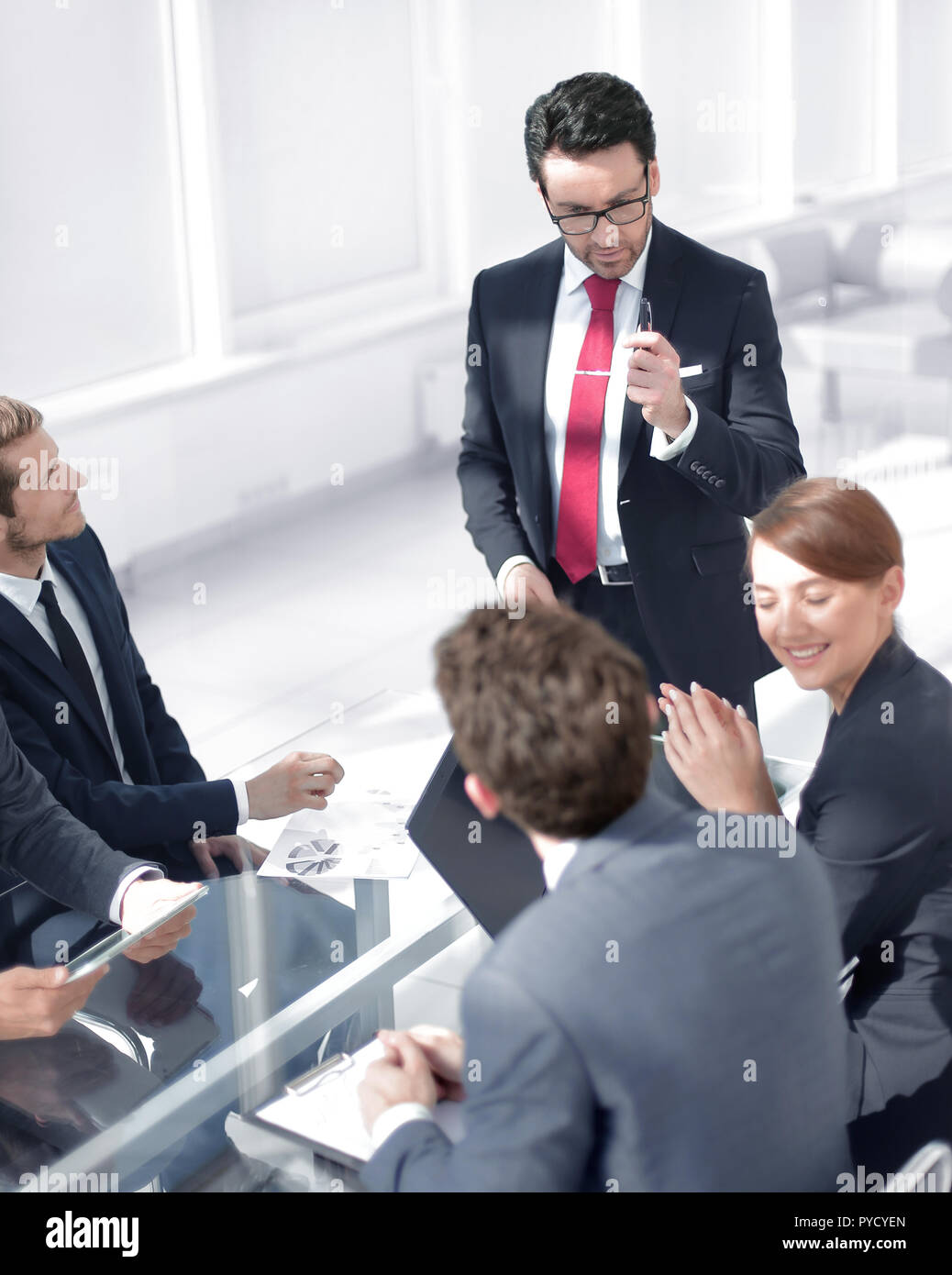 Manager explaining something young hi-res stock photography and images ...