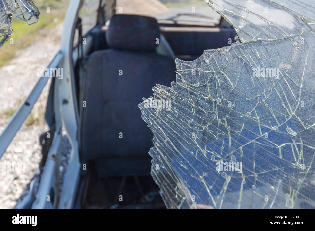 broken windshield on abandoned car Stock Photo