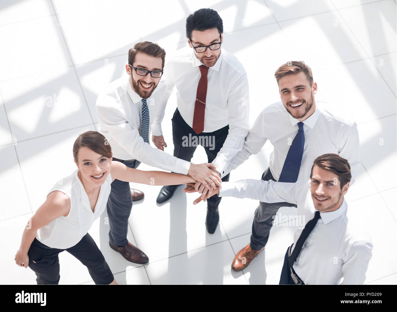 top view. successful business team showing their unity Stock Photo - Alamy