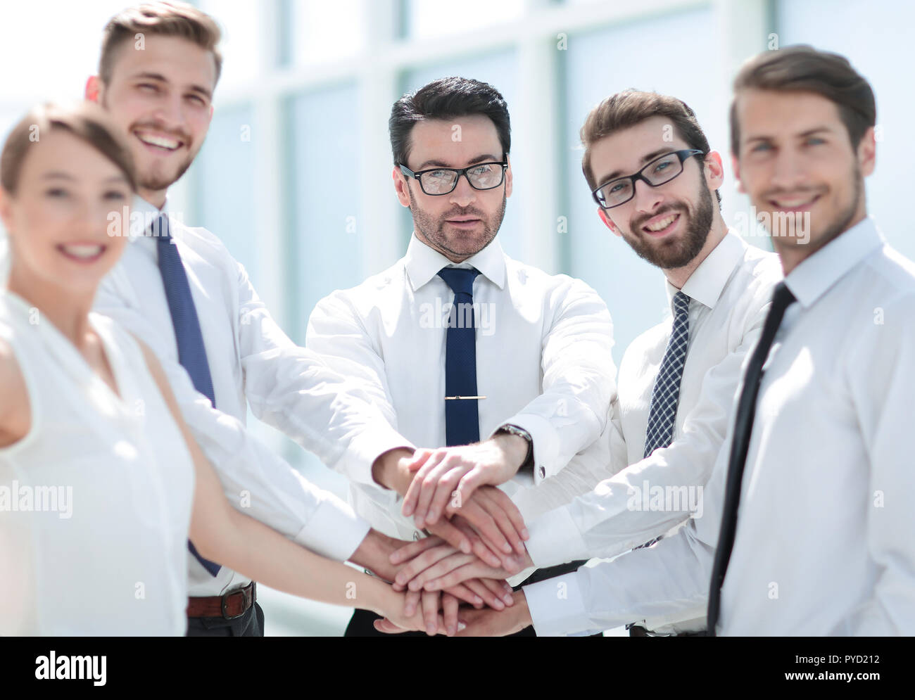 business team showing their unity Stock Photo - Alamy