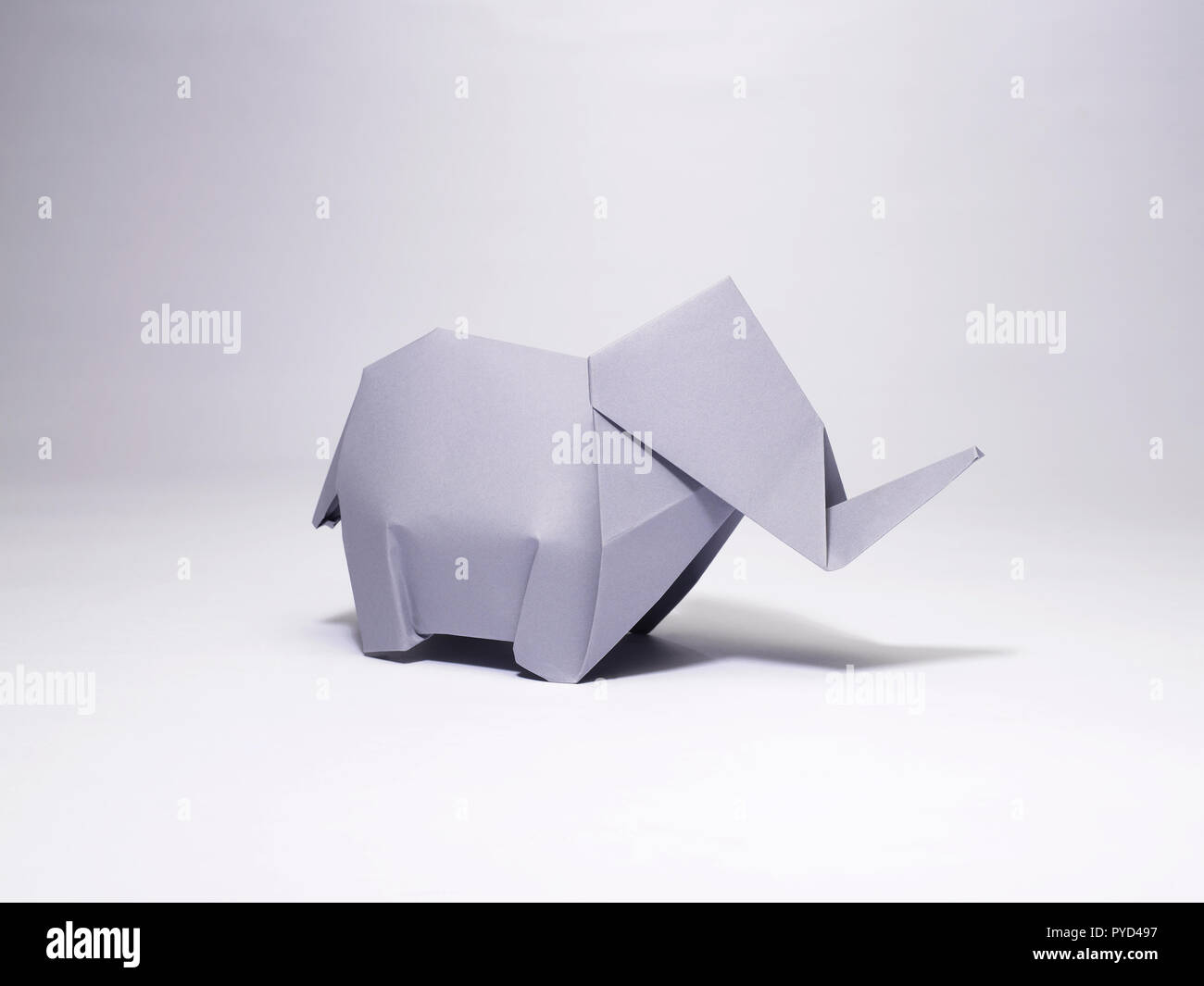 A STILL LIFE OF A PAPER ELEPHANT MADE WITH THE ART OF ORIGAMI Stock