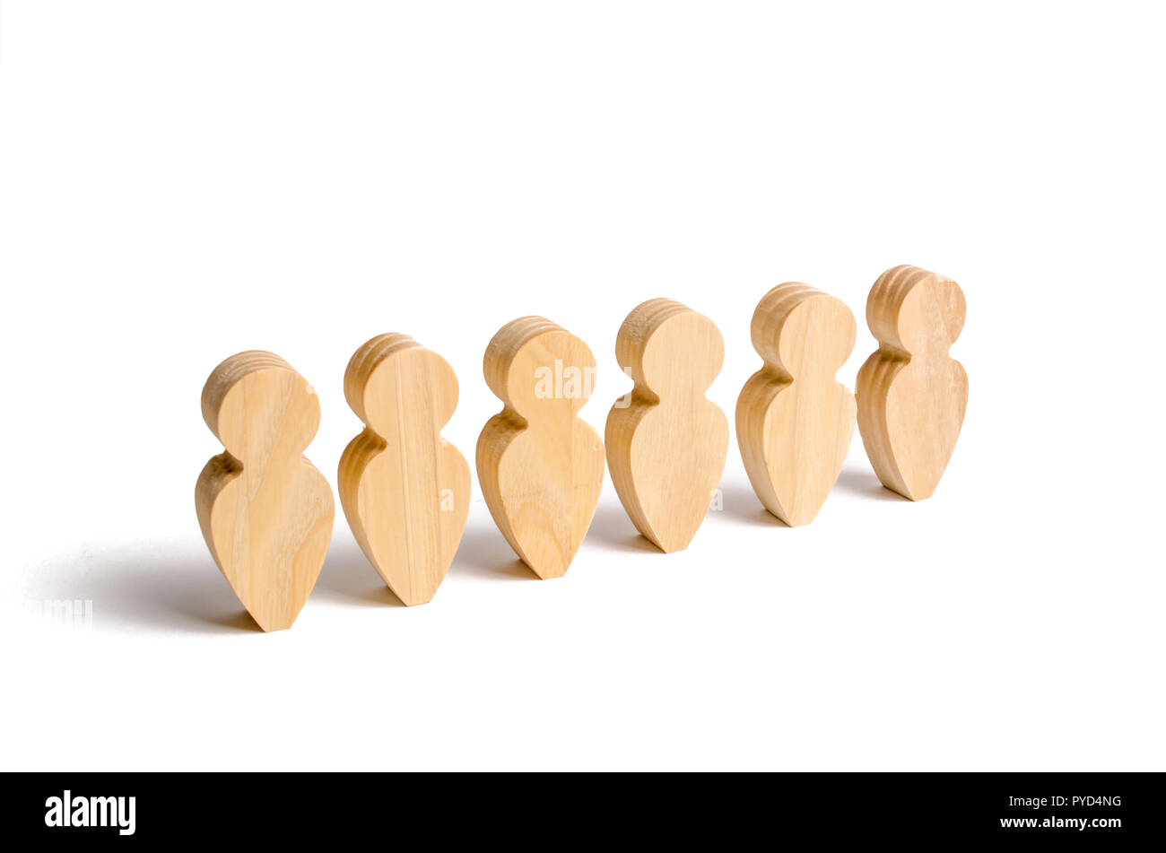 People stand in a formation on a white background. Discipline and order, submission. In anticipation of an order. People stand in line and listen. The Stock Photo